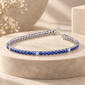 Bracciale tennis in oro bianco 18k con zaffiri blu e diamanti