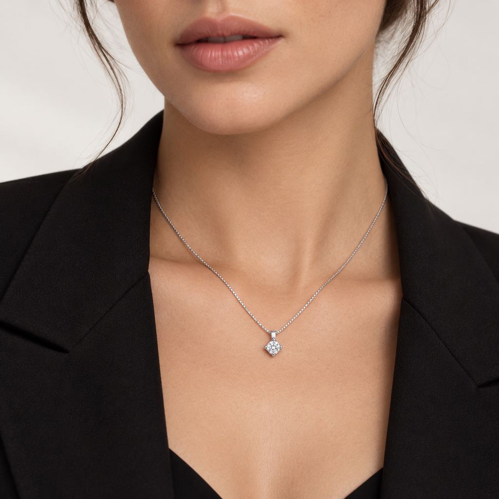 Collana punto luce oro bianco 18k con diamante di 0.20 carati