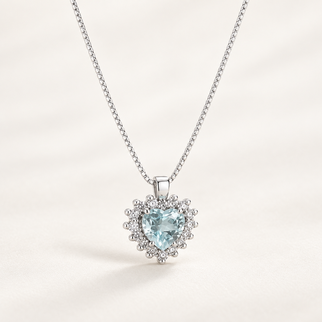 Collana in oro bianco 18k con acquamarina cuore diamanti contorno