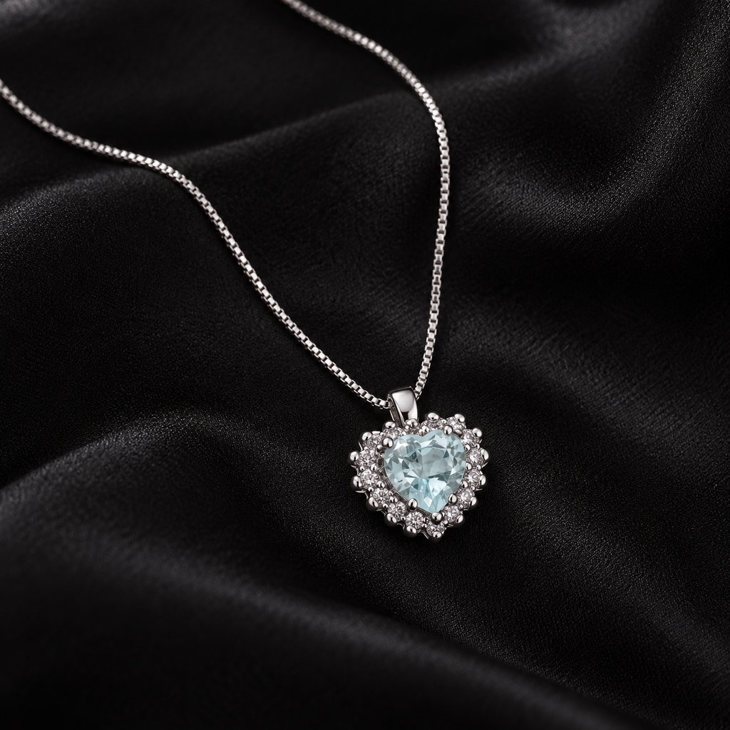 Collana in oro bianco 18k con acquamarina cuore diamanti contorno