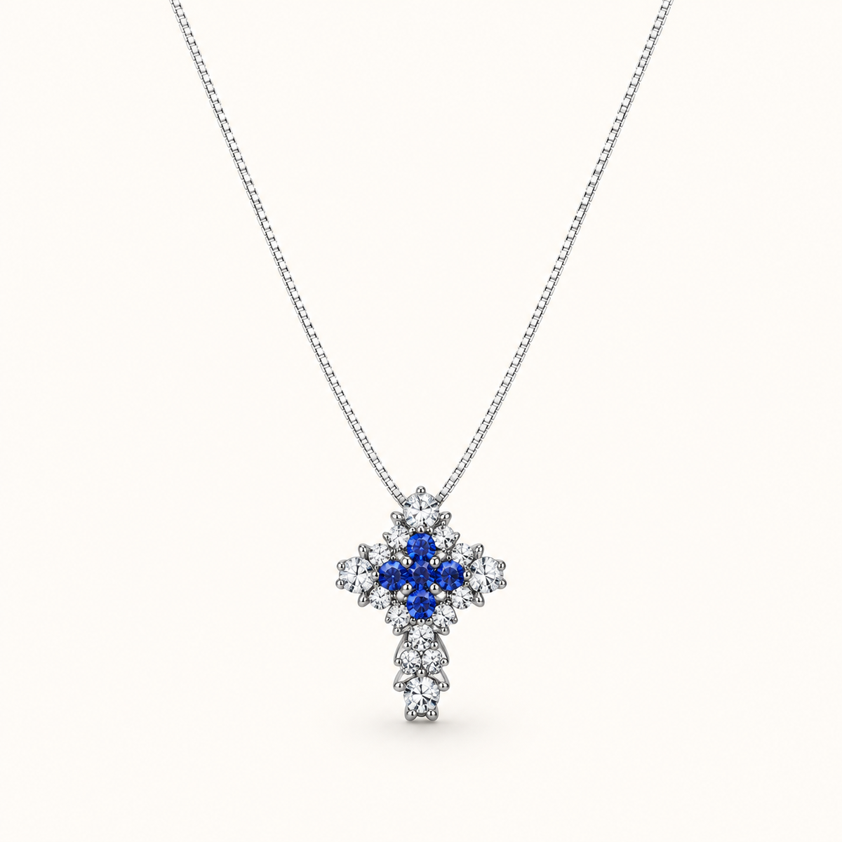 Collana con croce in oro bianco 18k con Diamanti e Zaffiri Blu