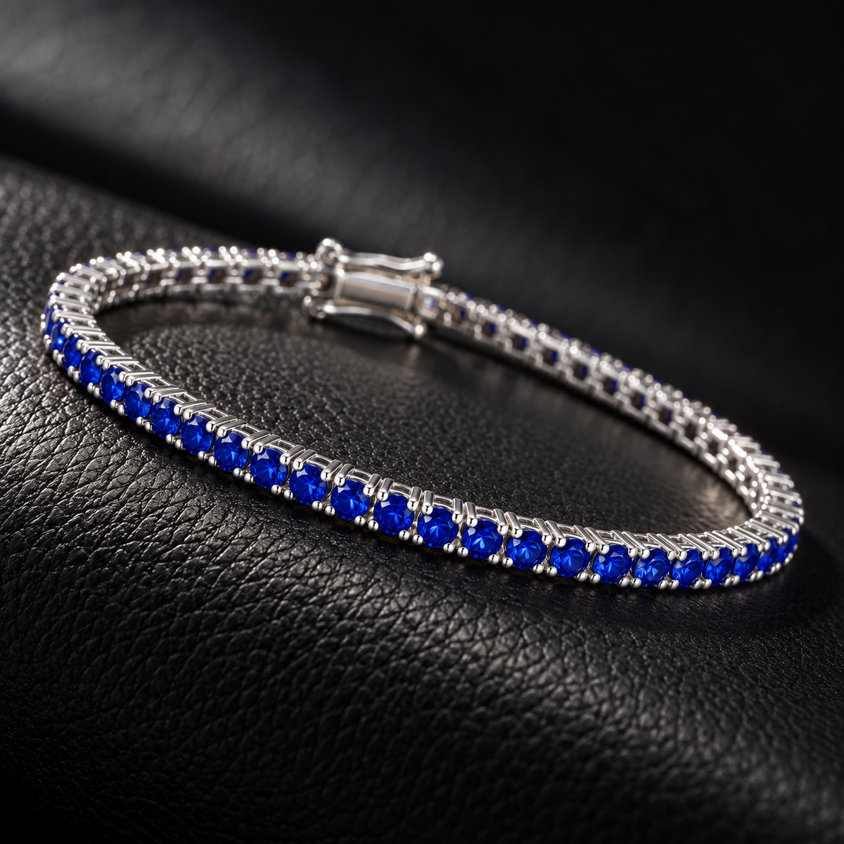 Bracciale Tennis in oro Bianco 18k con Zaffiri Blu