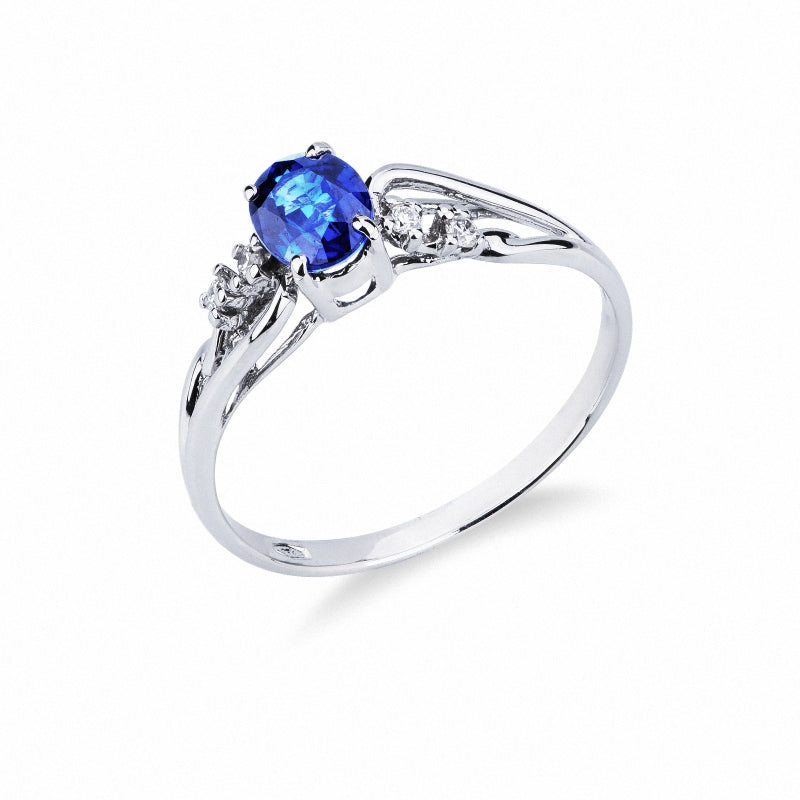 Anello Intreccio a fascia in Oro Bianco 18k con Zaffiro Blu e Diamanti