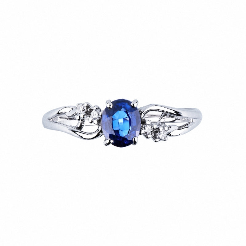 Anello Intreccio a fascia in Oro Bianco 18k con Zaffiro Blu e Diamanti