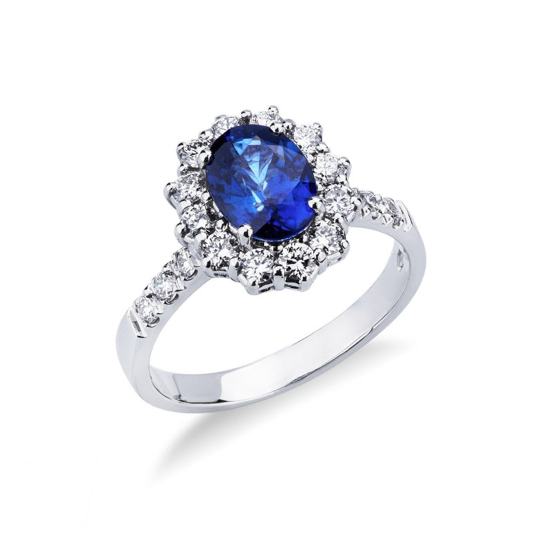 Anello Royal in oro bianco 18k con diamanti su gambo e contorno e Zaffiro Blu