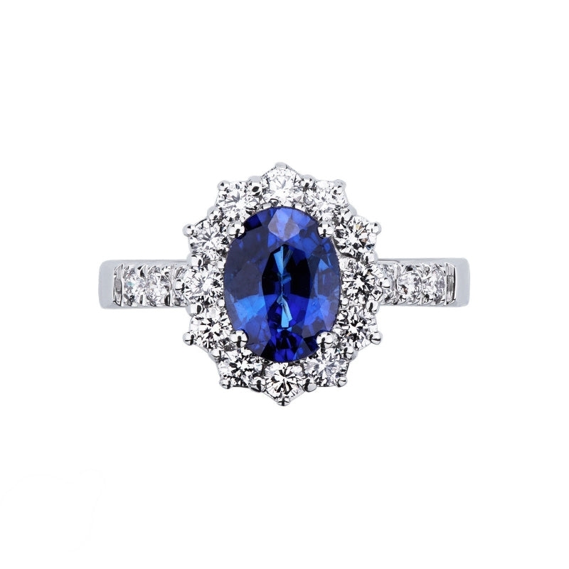 Anello Royal in oro bianco 18k con diamanti su gambo e contorno e Zaffiro Blu