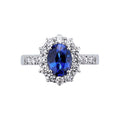 Anello Royal in oro bianco 18k con diamanti su gambo e contorno e Zaffiro Blu