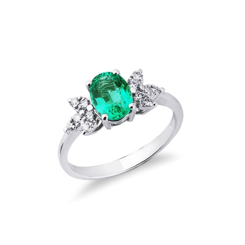 Anello Armonia in Oro bianco 18k con Smeraldo ovale e Diamanti sui lati.