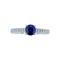 Anello Noble in oro bianco 18k con Zaffiro blu centrale e diamanti nel gambo