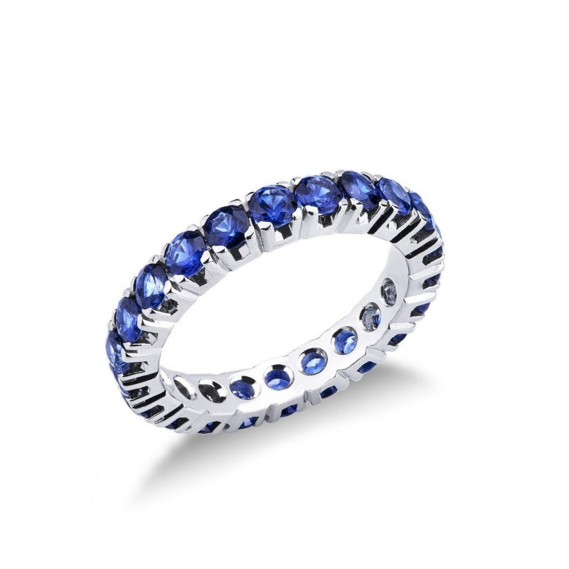 Anello Eternity in Oro Bianco 18k con Zaffiro Blu