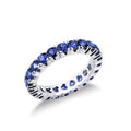 Anello Eternity in Oro Bianco 18k con Zaffiro Blu