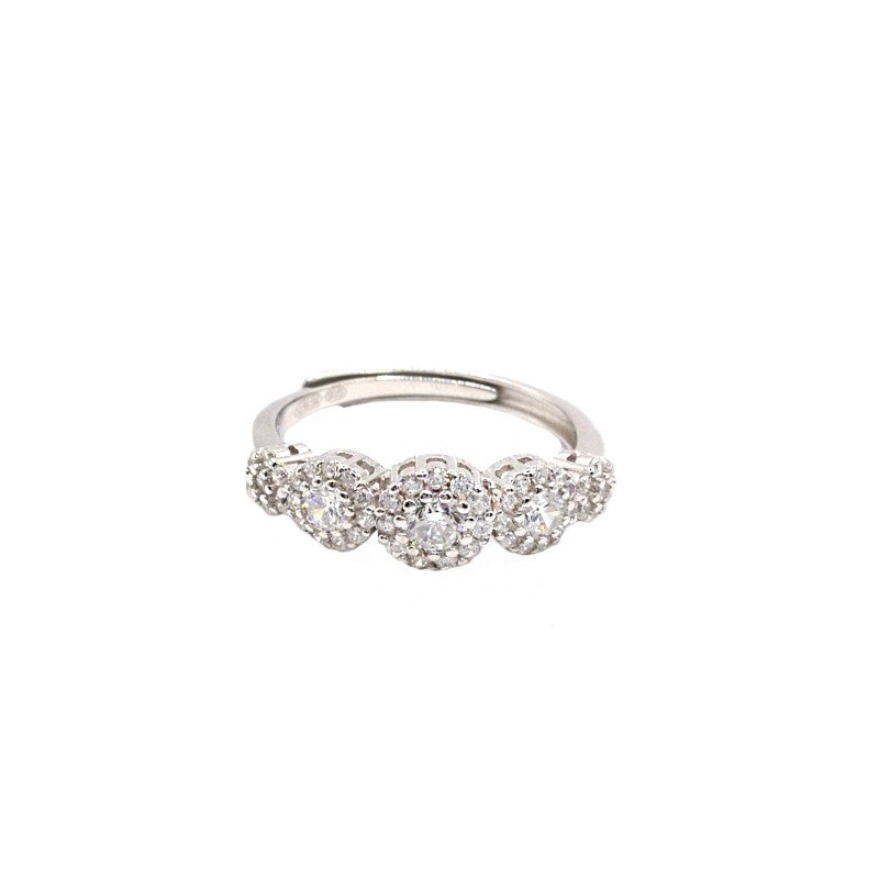 Anello regolabile Magic Gradazione con Swarovski bianchi a 5 fiori tondi