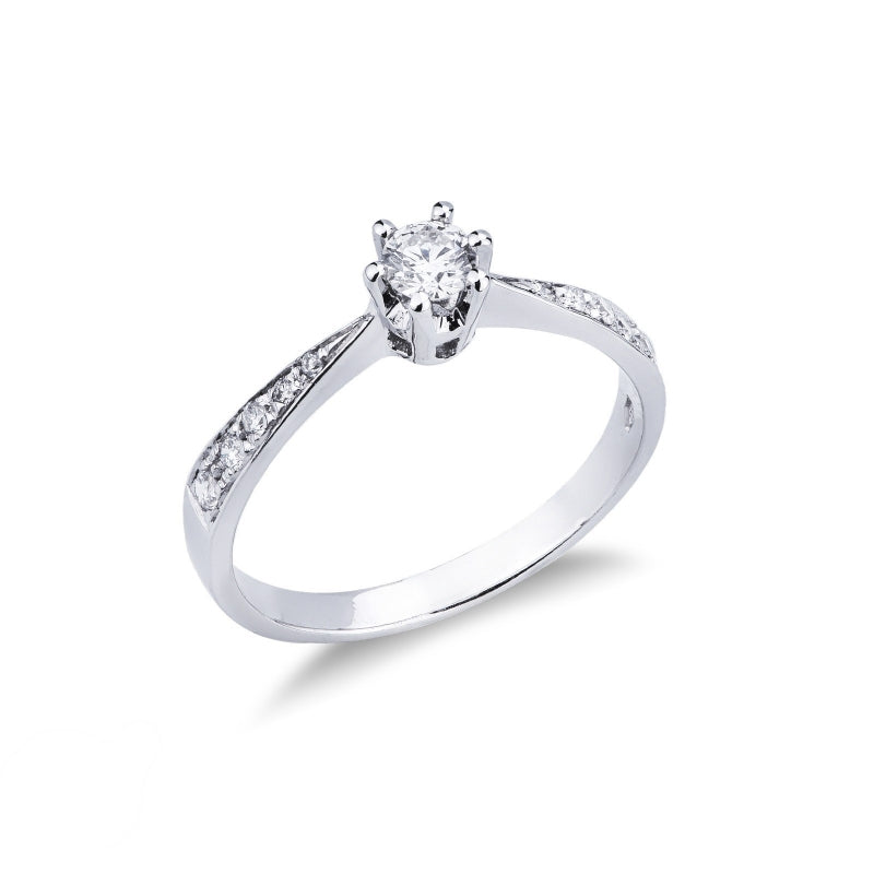 Anello Solitario Eleganza con diamanti sulla fascia in oro bianco 18kt